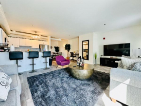 Downtown 2BR Penthouse Suite with Balcony and Direct Skybridge Access